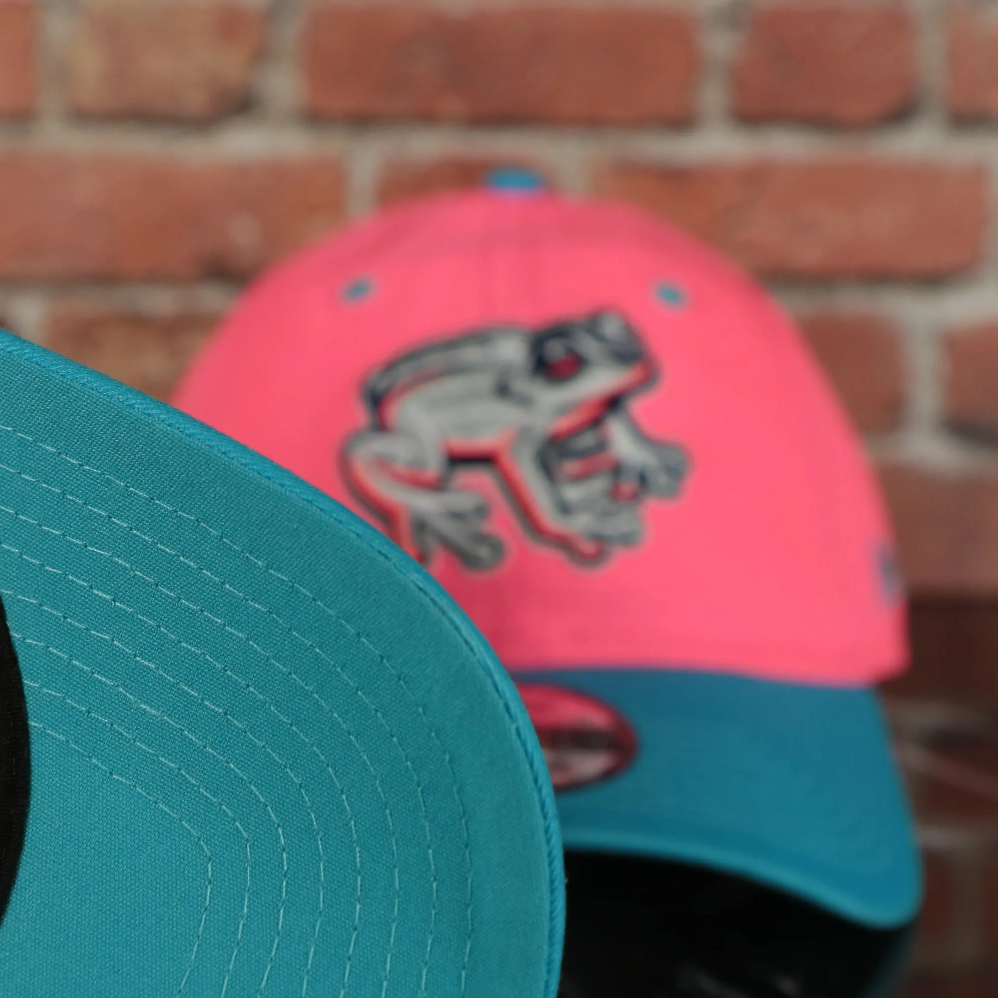 Lehigh Valley Ironpigs Coqui Copa De La Diversion 2023 Two-Tone Black Bottom 9Twenty Dad Hat | Pink/Blue 920