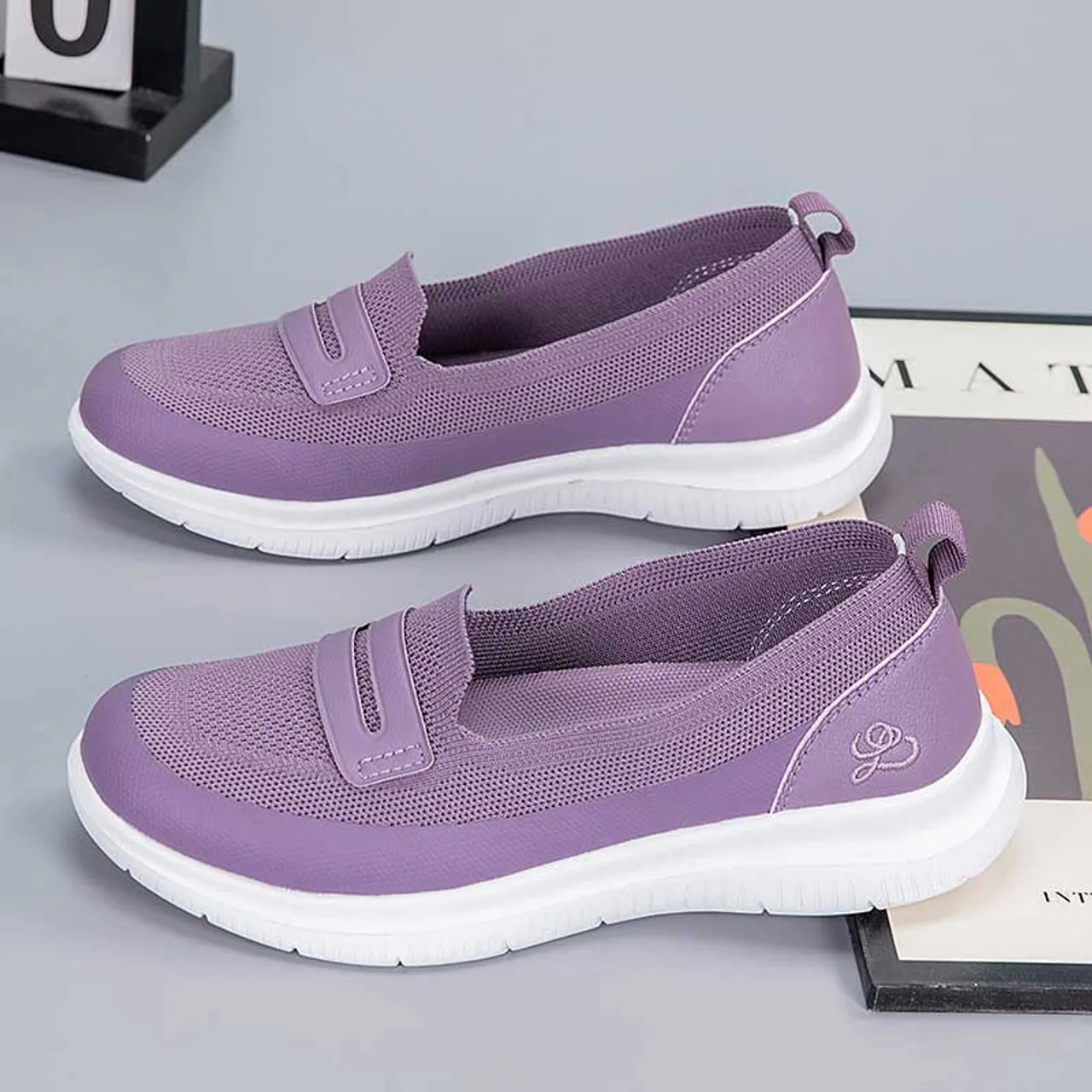 Purple flyknit pattern penny slip on shoe sneaker